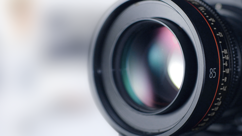 close-up of a camera lens with visible lens reflections close-up of a camera lens with visible lens reflections